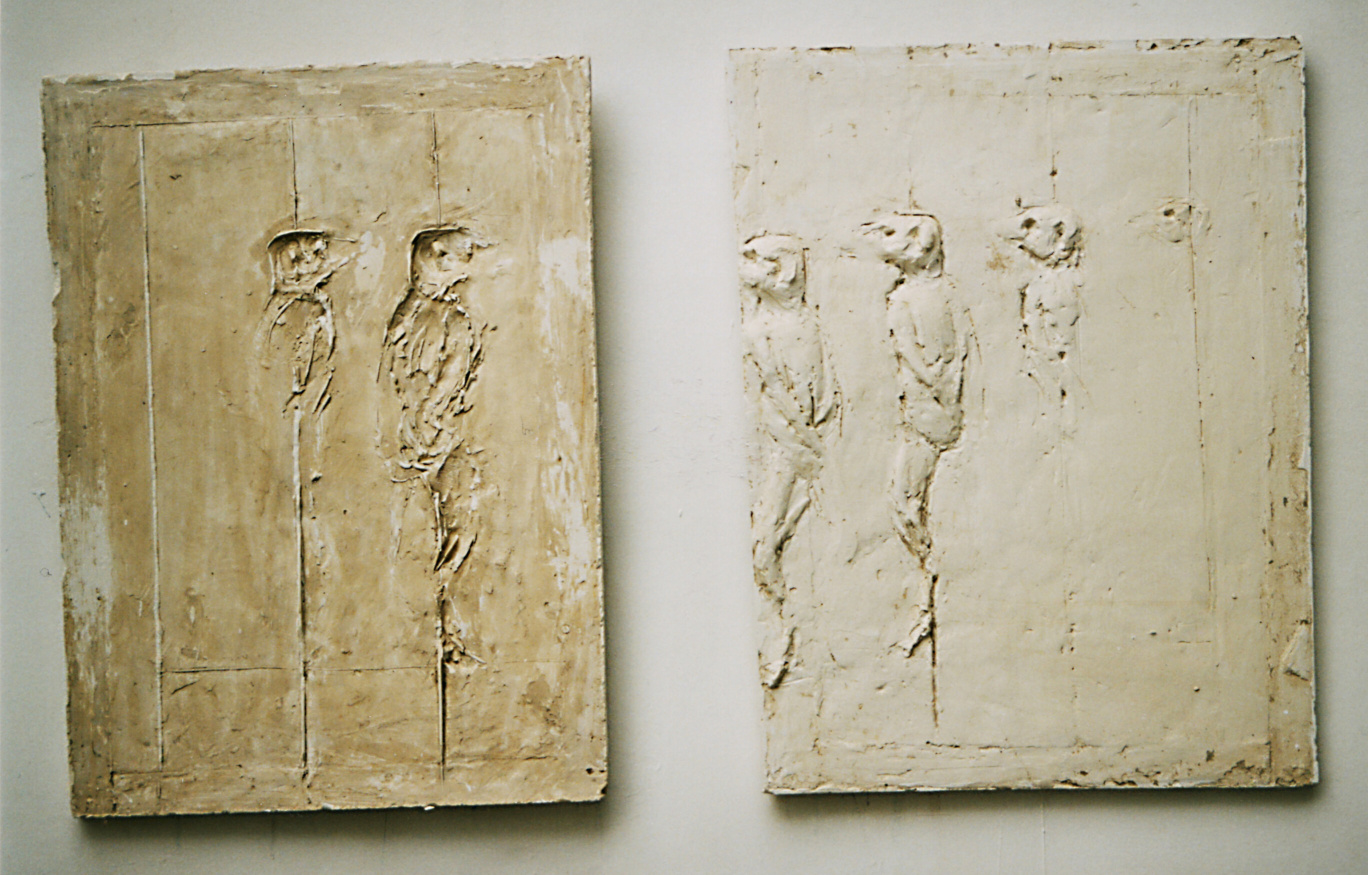 DISAPPEARING, 2003, plaster, 2 pieces each 65x40x6 cm